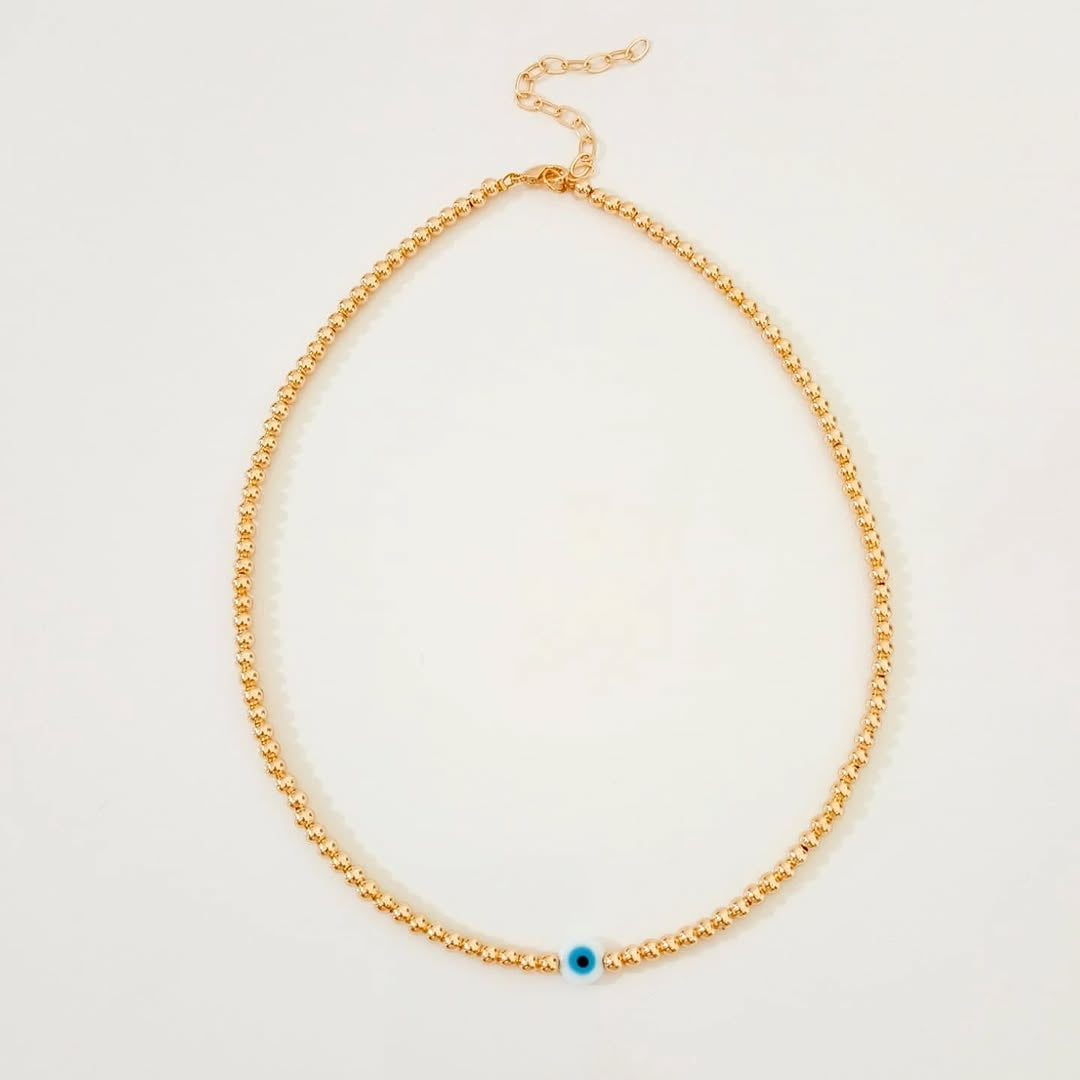 Collar ojito y collar cuerno turquesa (piezas por separado)