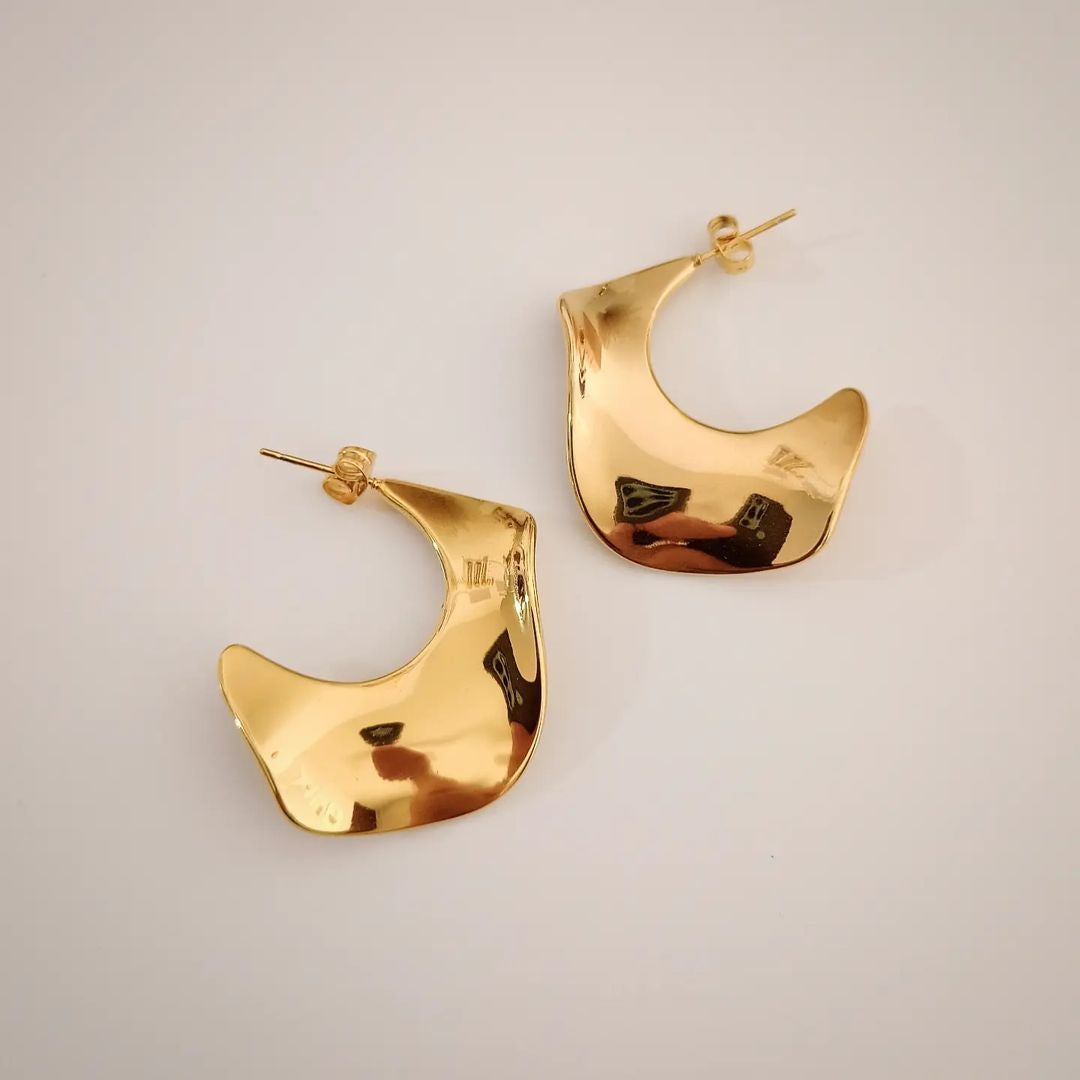 Aretes dorado reflejante