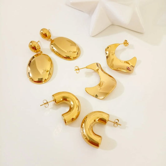 Aretes dorado reflejante