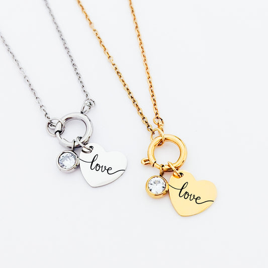 Collar broche con corazón colgante