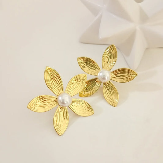 Arete flor con perla