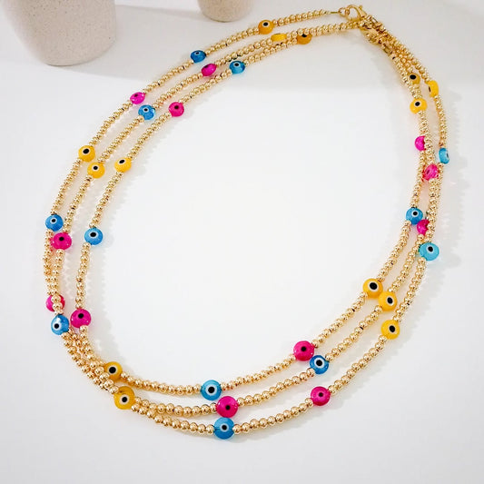 Collar dorado ojitos colores
