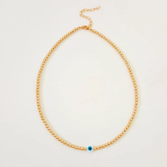 Collar dorado con ojito