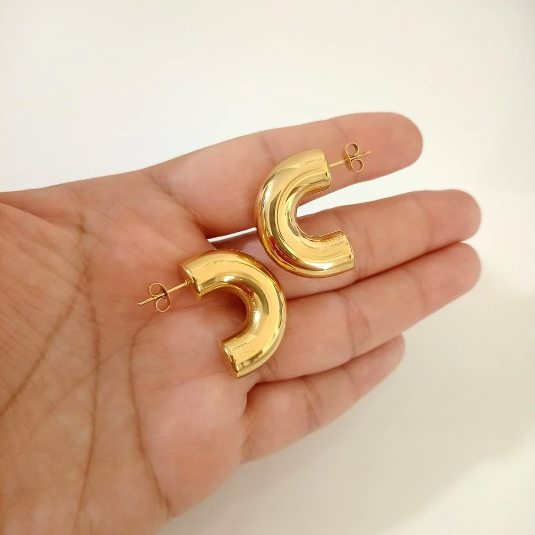 Aretes dorado reflejante