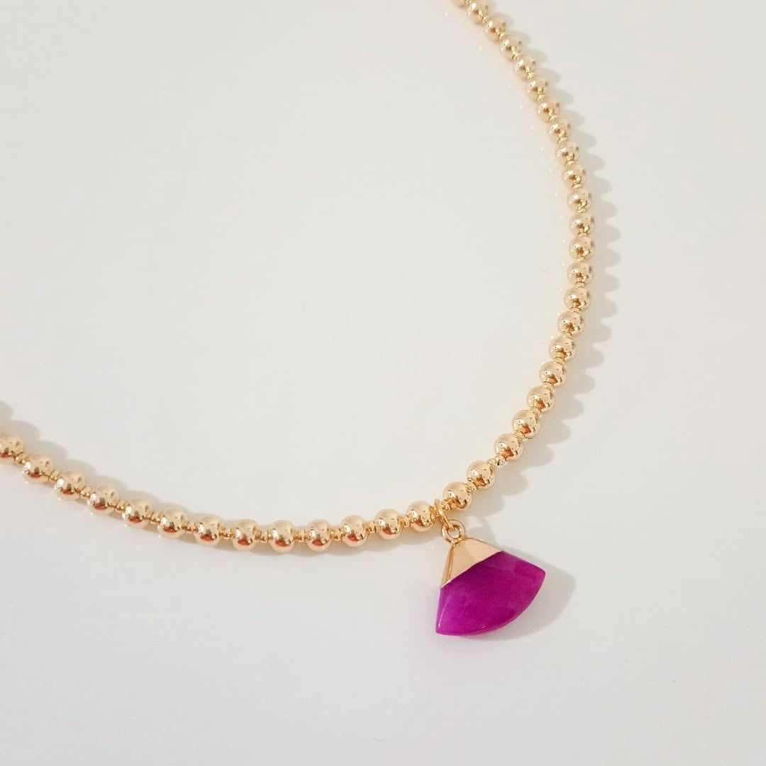 Collar colores piedra amarilla, collar dorado piedra violeta y collar dije elefante (piezas por separado)