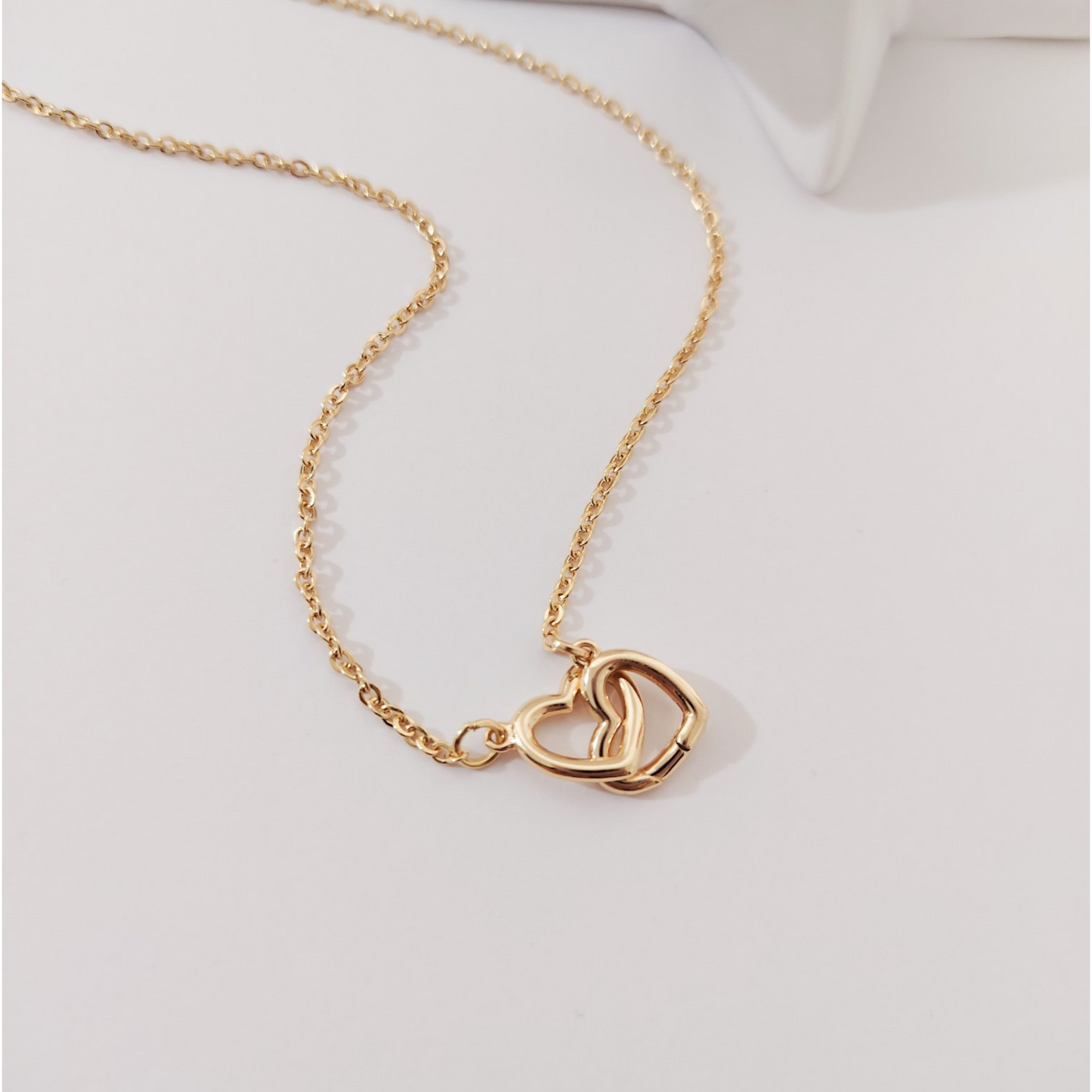 Collar corazones entrelazados