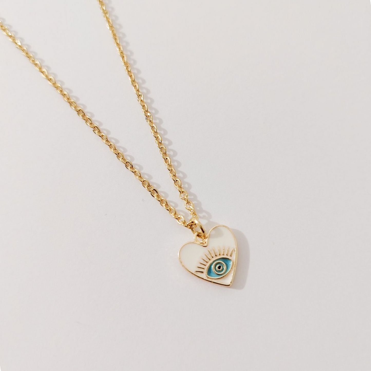 Collar corazón ojito colores