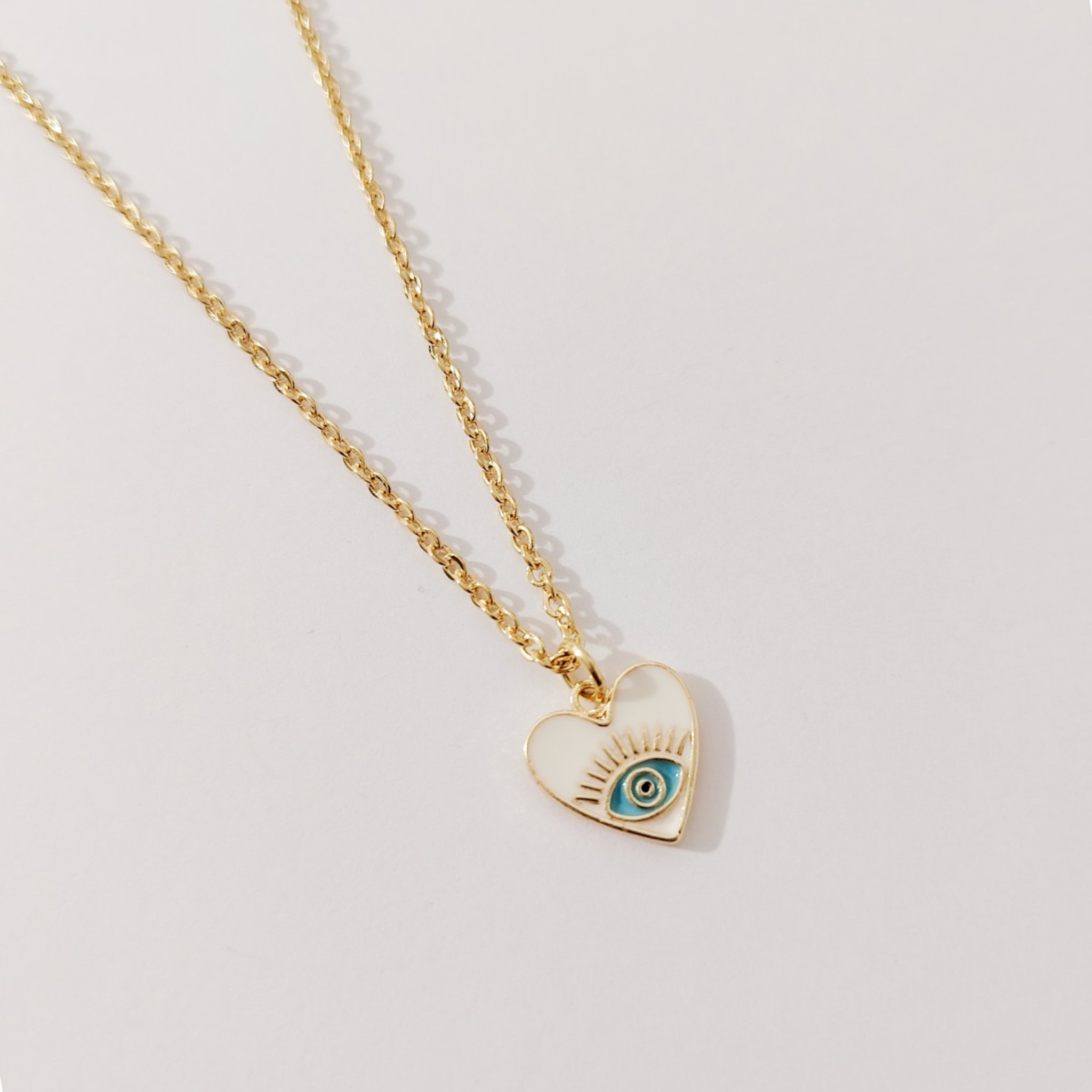 Collar corazón ojito colores