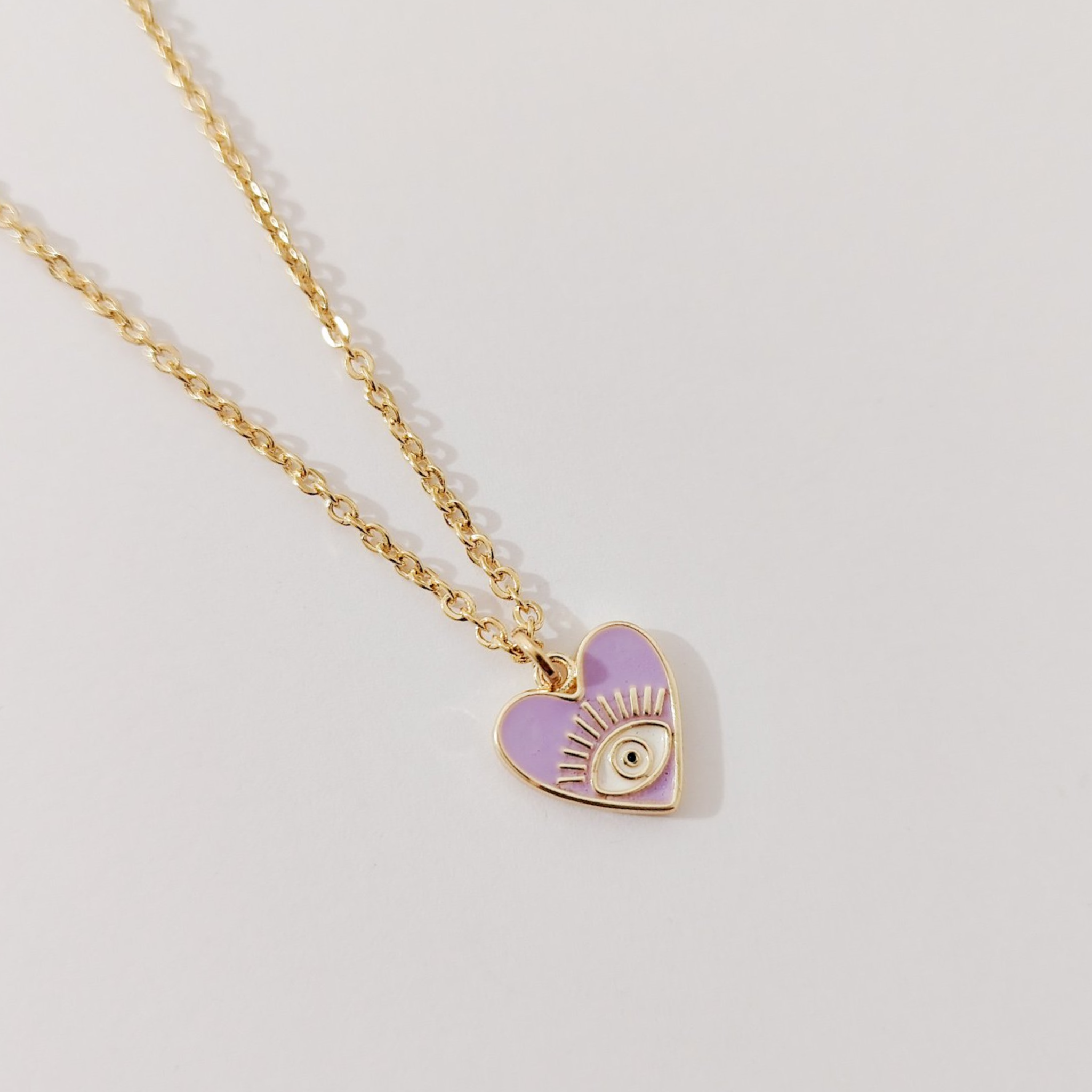 Collar corazón ojito colores