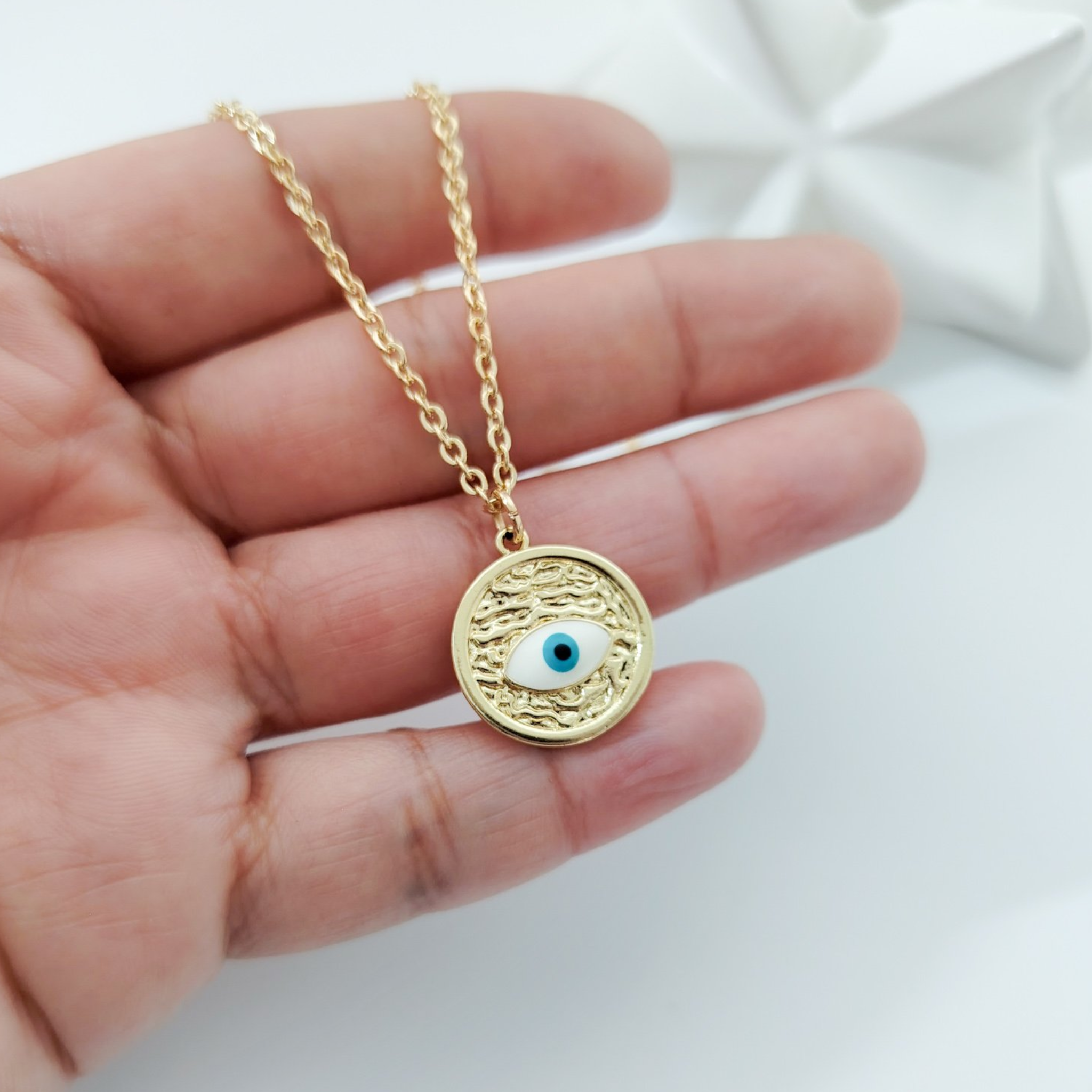 Collar dije moneda ojo