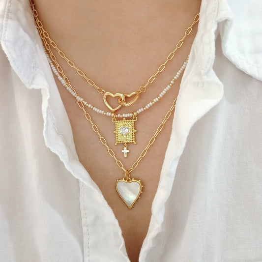 Collar corazones entrelazados, collar escapulario y collar dije corazón nacar (piezas por separado)