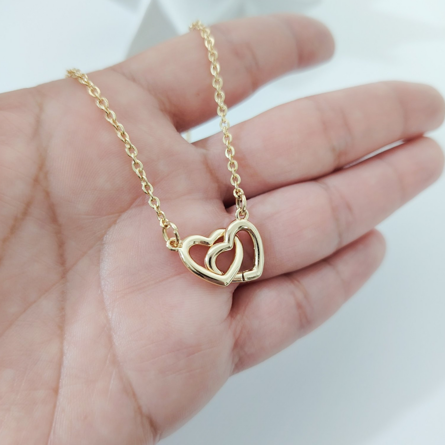 Collar corazones entrelazados