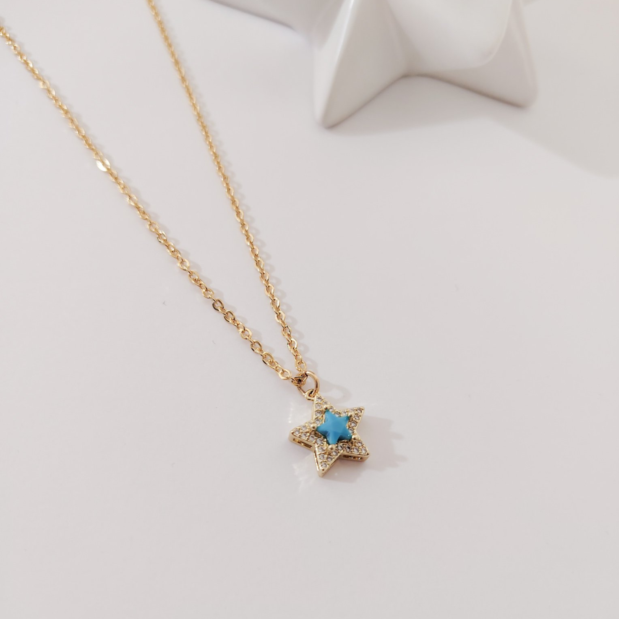 Collar dije estrella azul con zirconia