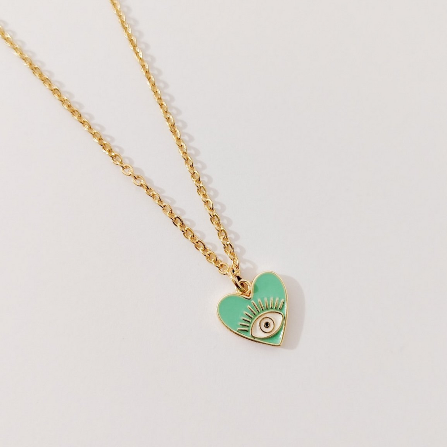 Collar corazón ojito colores