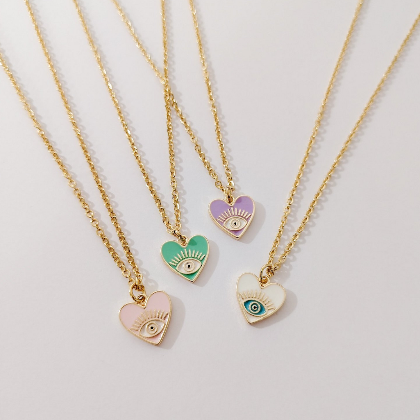 Collar corazón ojito colores