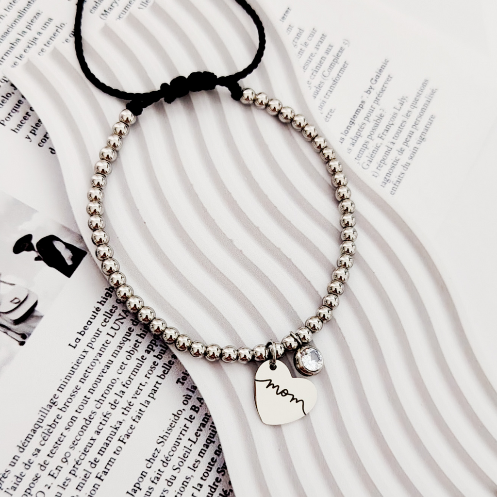 Pulsera de bolitas corazón colgante