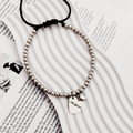 Pulsera de bolitas corazón colgante