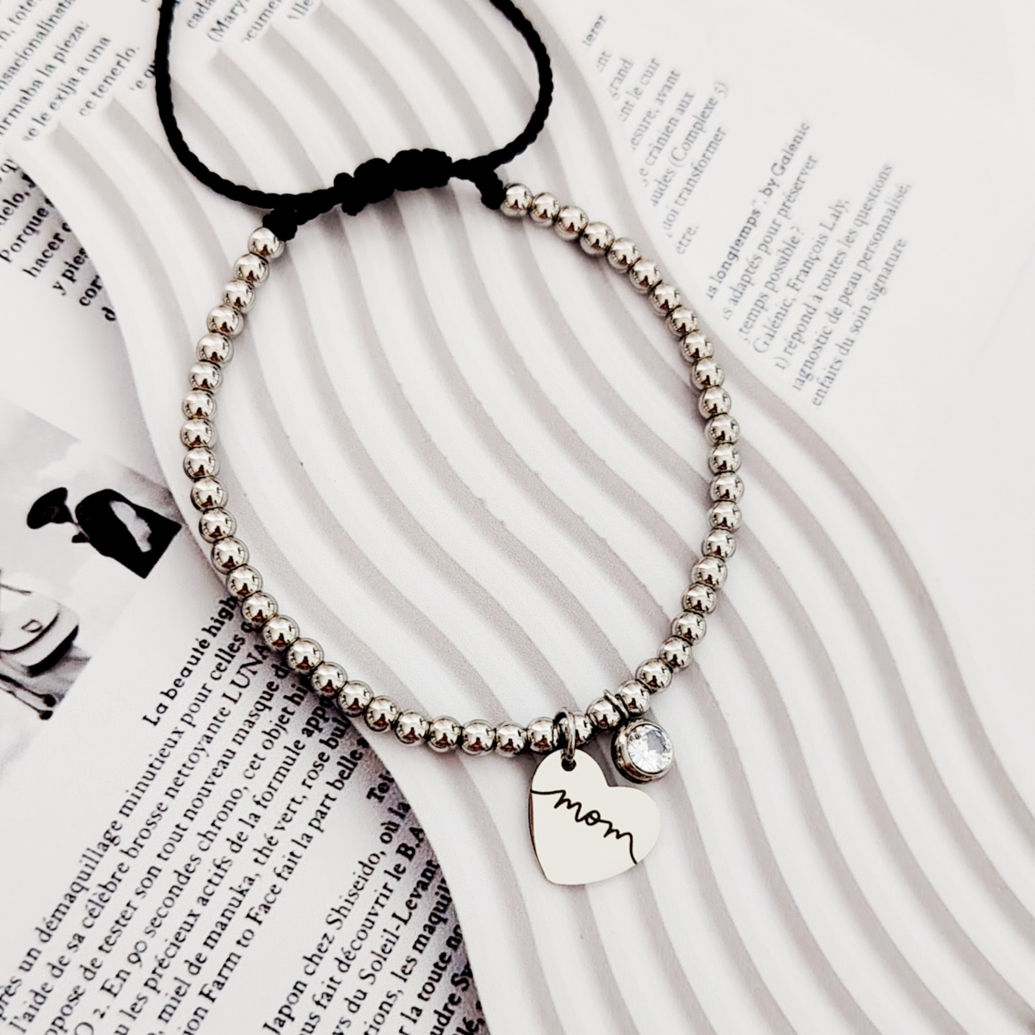 Pulsera de bolitas corazón colgante