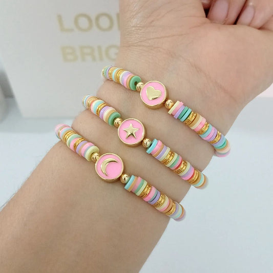 Pulsera puca colores con luneta rosa figura